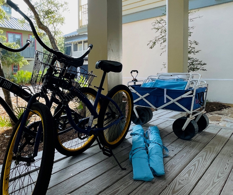 Bikes Umbrellas Beach Chairs on Porch