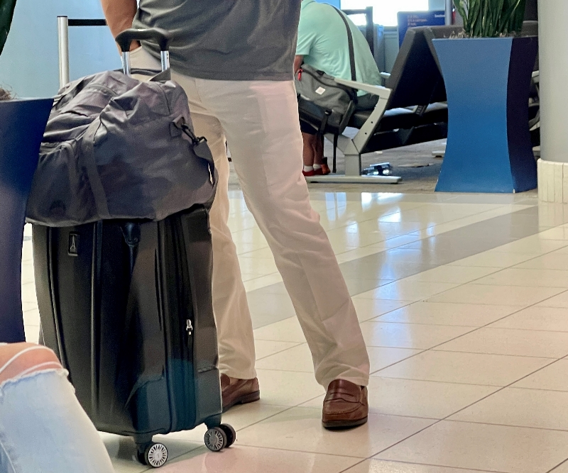Man with Carry-On Luggage