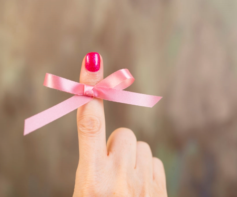 Pink Ribbon on Finger